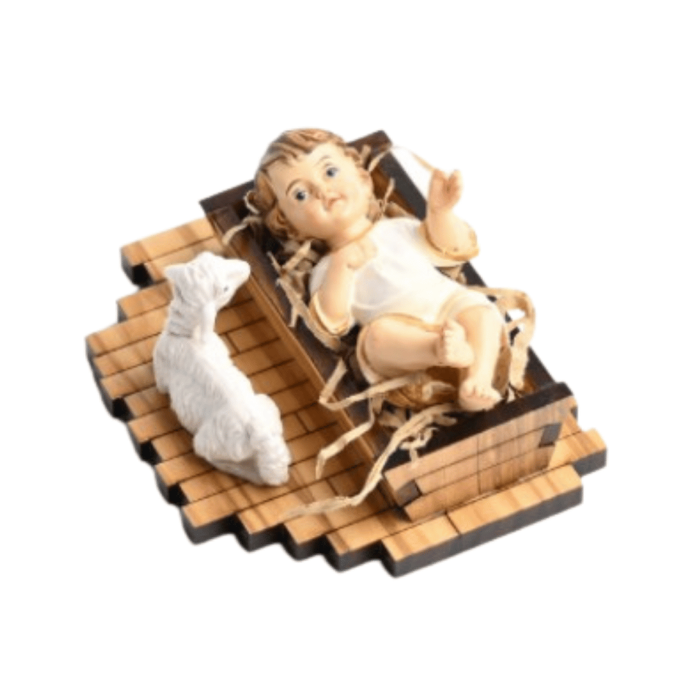Infant Jesus and a lamb in a manger